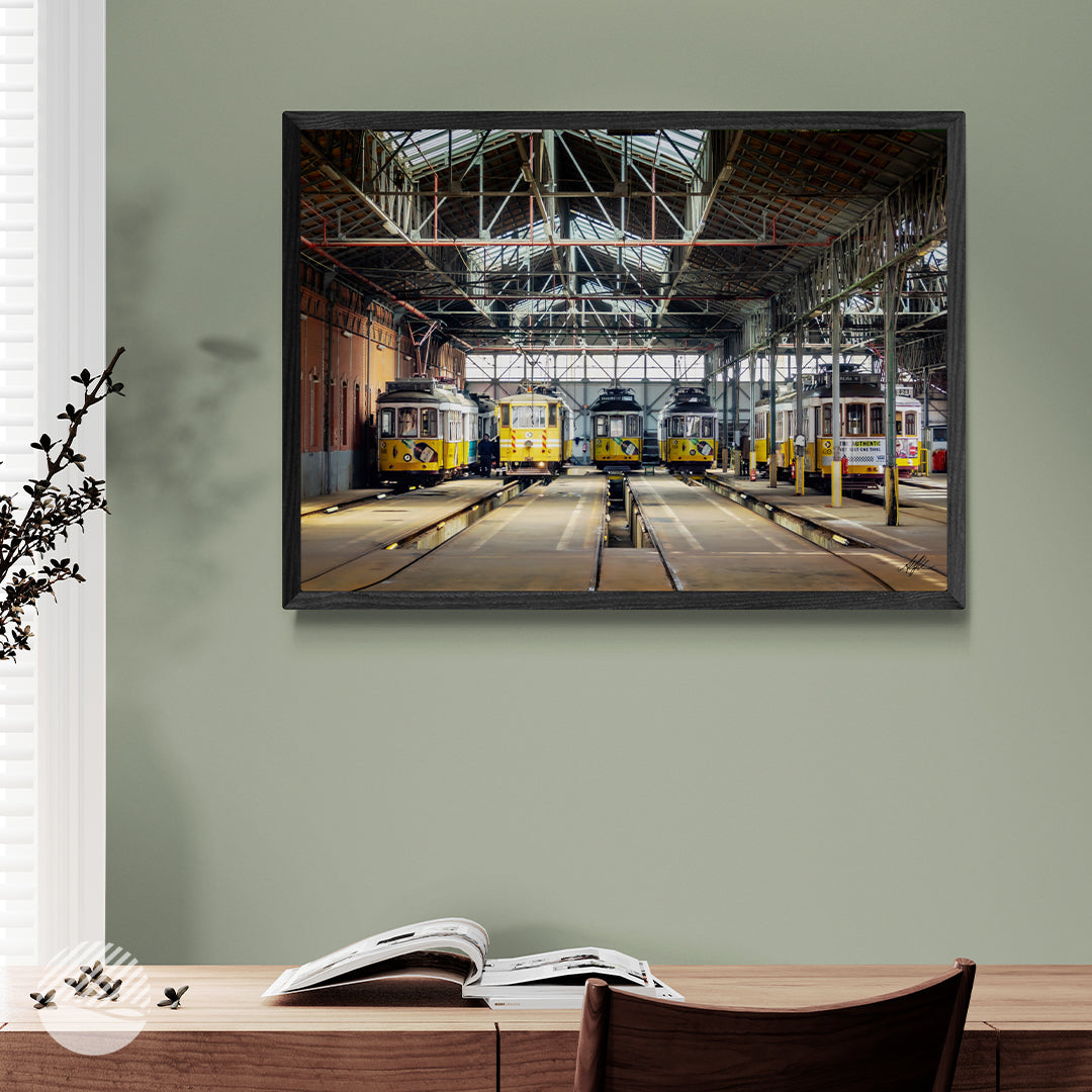 Tram Central, Lisbon by Alantherock, framed photo print of Lisbon trams on a sage green wall